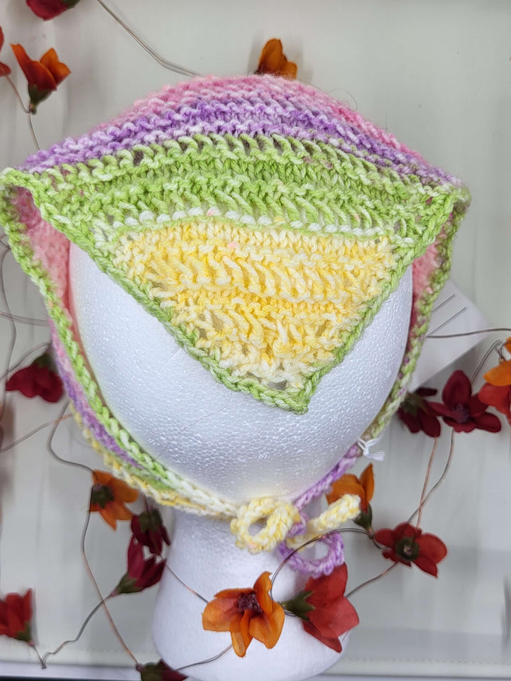 Colorful Knit Bandana displayed on a mannequin head, perfect for various occasions and adding elegance to your outfit.