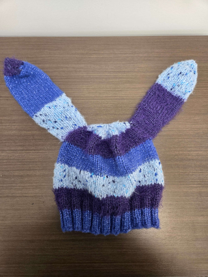 Bunny Hat with purple and blue stripes, featuring long bunny ears, perfect for warmth in cold seasons.