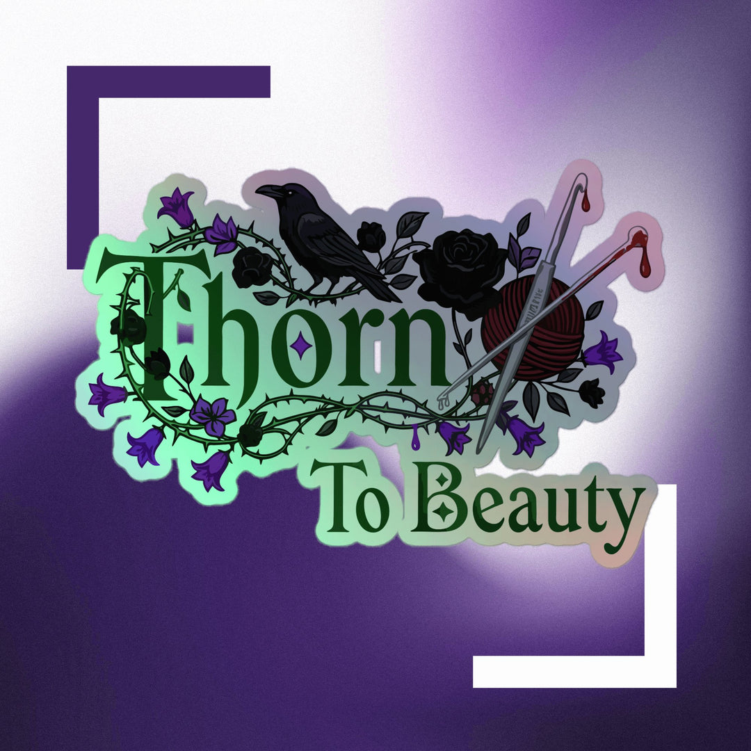 Thorn To Beauty logo with a crow, flowers, and knitting needles, featuring vibrant colors and a striking design.
