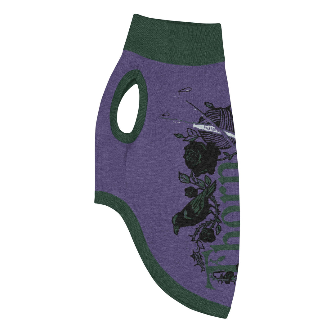 Knitted pet sweater in purple with floral design, perfect for keeping furry friends warm and stylish.