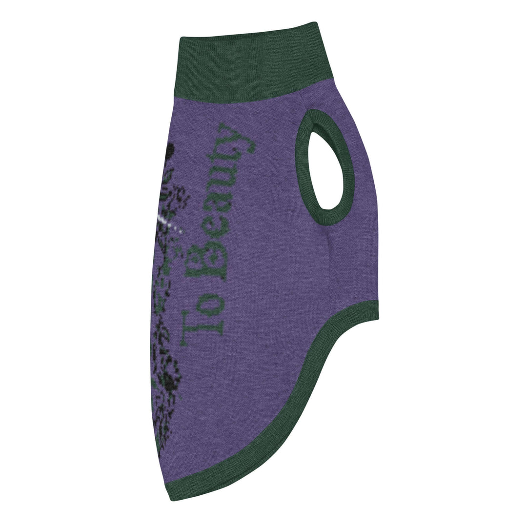 Knitted pet sweater in purple with green trim, featuring a stylish print for fashionable furry friends.