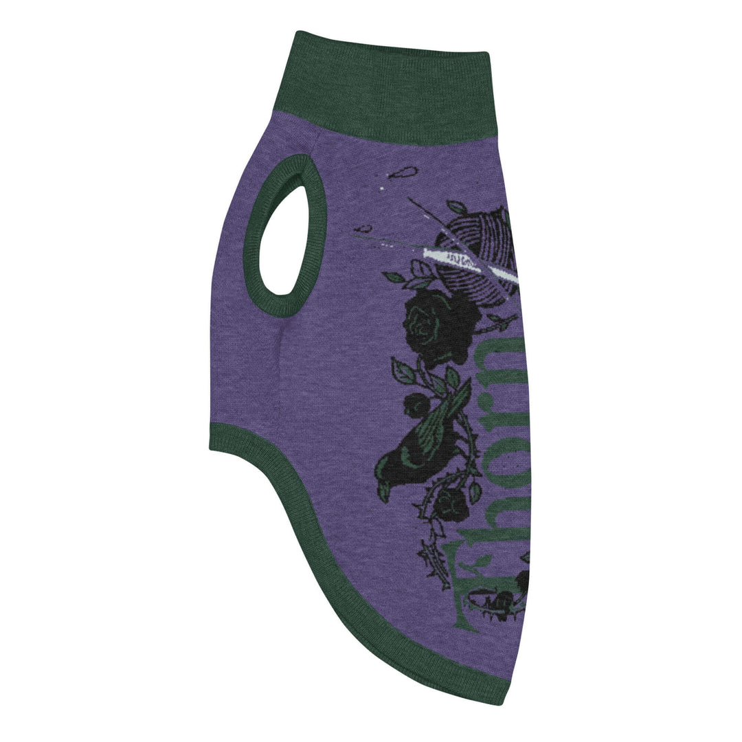 Knitted pet sweater in purple with rose and bird design, perfect for stylish furry friends.